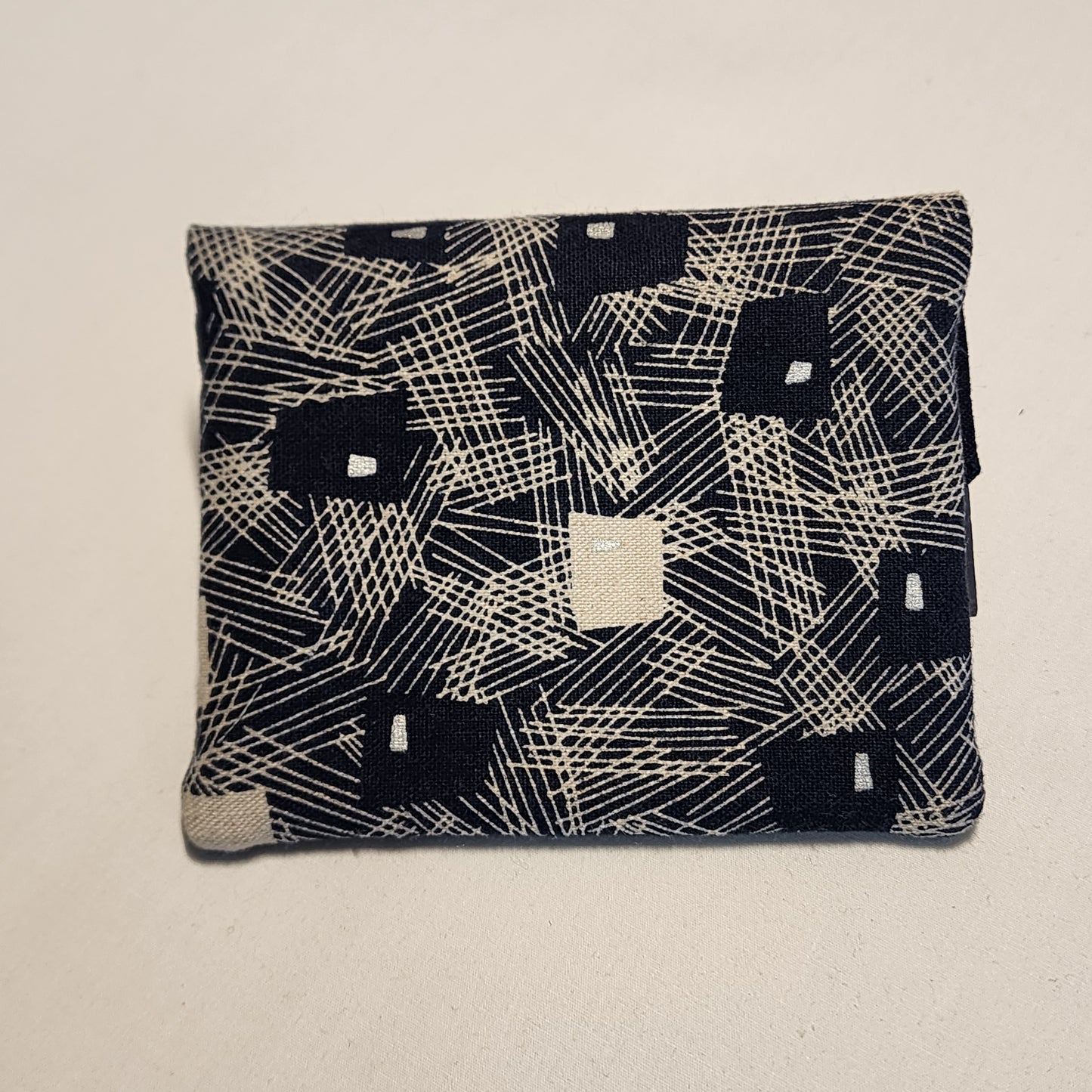 
                  
                    Card Wallet in Abstract Lines
                  
                