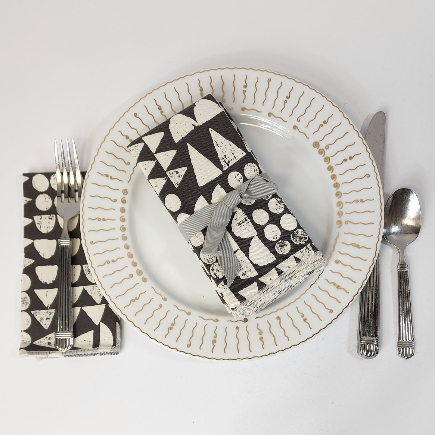 
                  
                    Dinner Napkin Set in Imprint Grey
                  
                