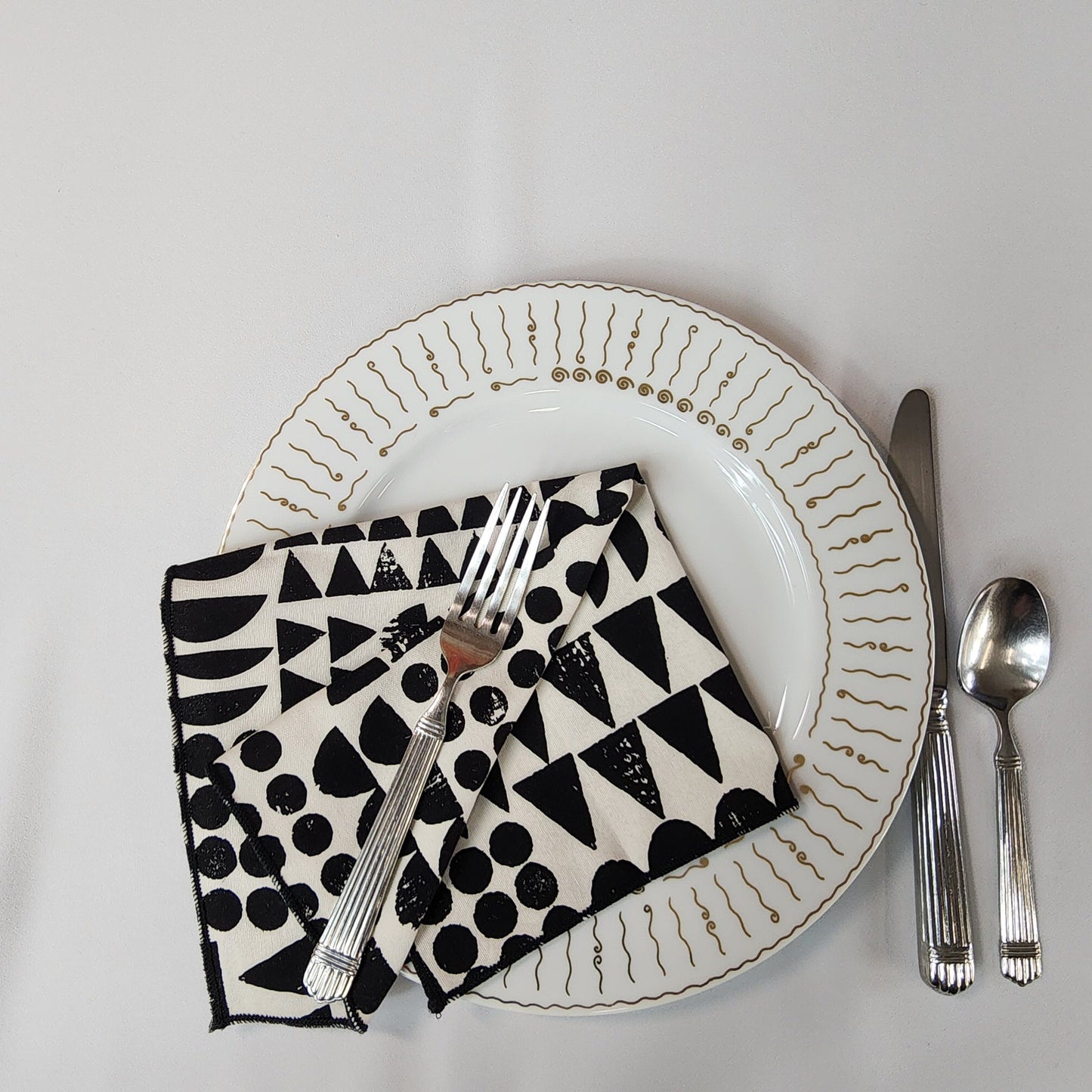 
                  
                    Dinner Napkin Set in Organic Cotton Imprint Black
                  
                