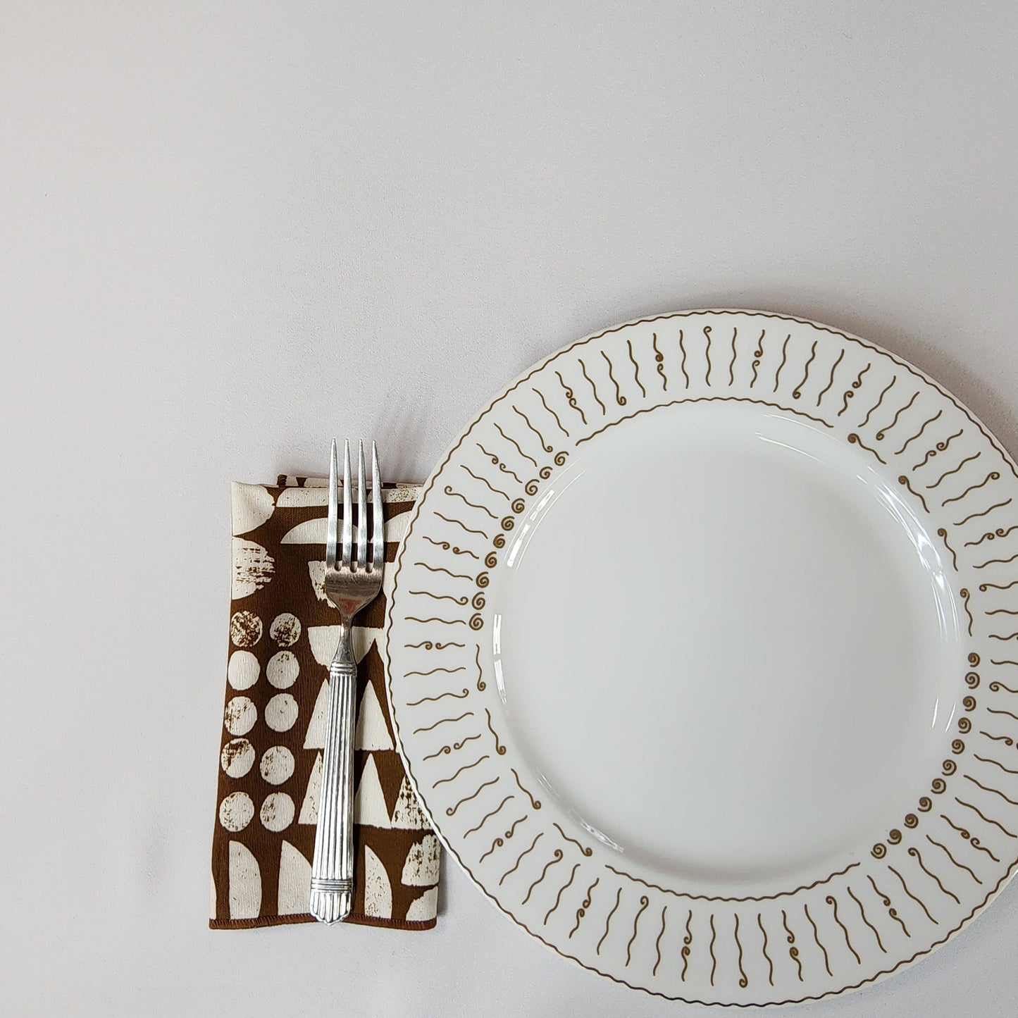 
                  
                    Dinner Napkin Set in Organic Cotton Imprint Brown
                  
                