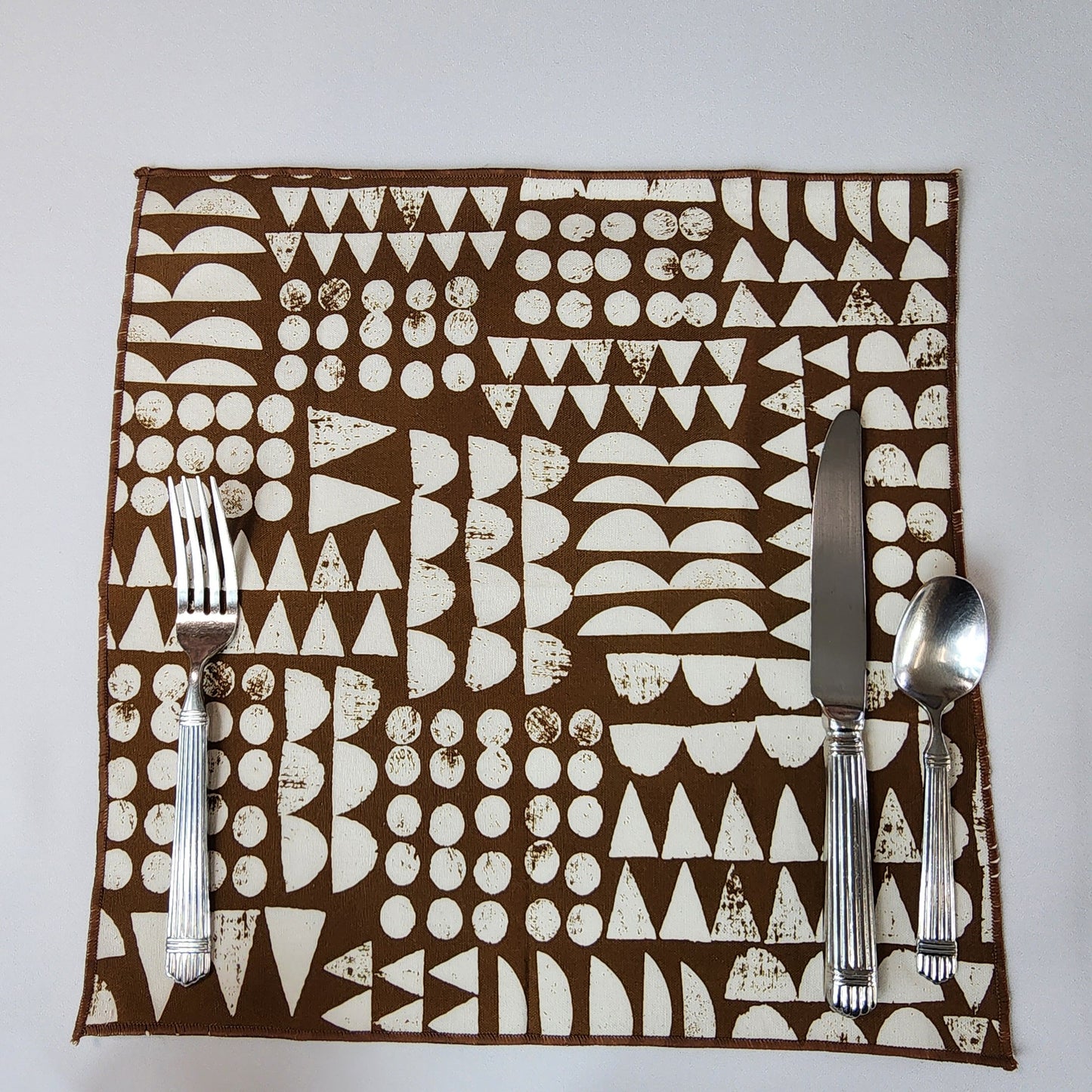 
                  
                    Dinner Napkin Set in Organic Cotton Imprint Brown
                  
                