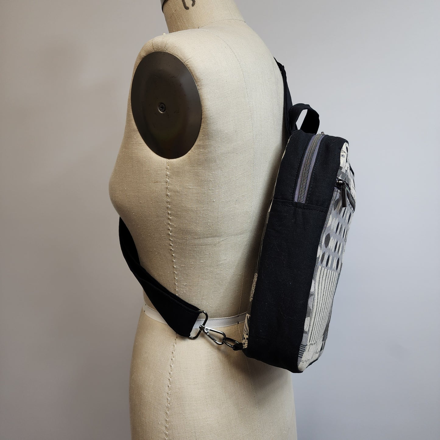 
                  
                    Sling Cross Body Bag in Black and White Collage
                  
                