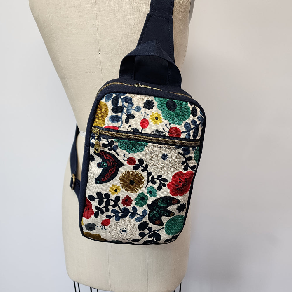 
                  
                    Sling Cross Body Bag in Scandi Life
                  
                