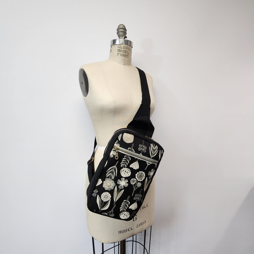 
                  
                    Sling Cross Body Bag in Simple Flower Black
                  
                