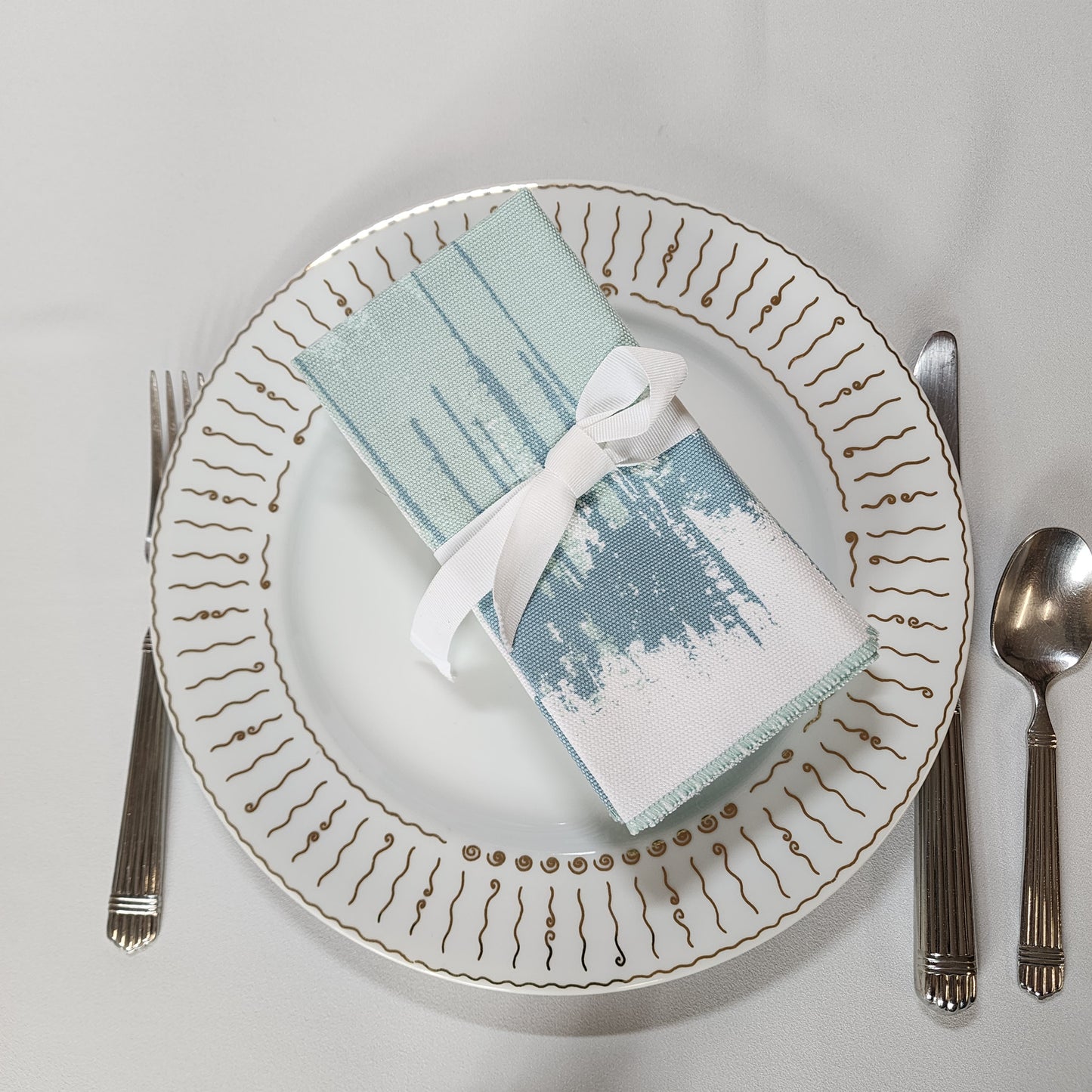
                  
                    Dinner Napkin Set in Coastal Mist
                  
                
