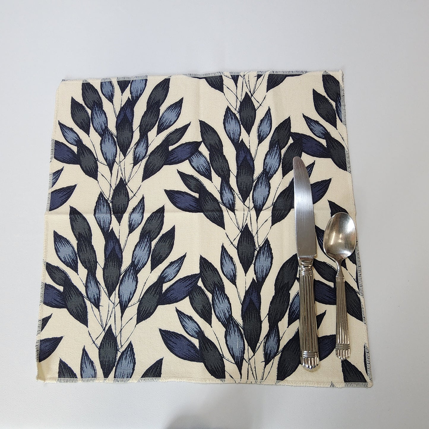 
                  
                    Dinner Napkin Set in Brushed Leaves
                  
                