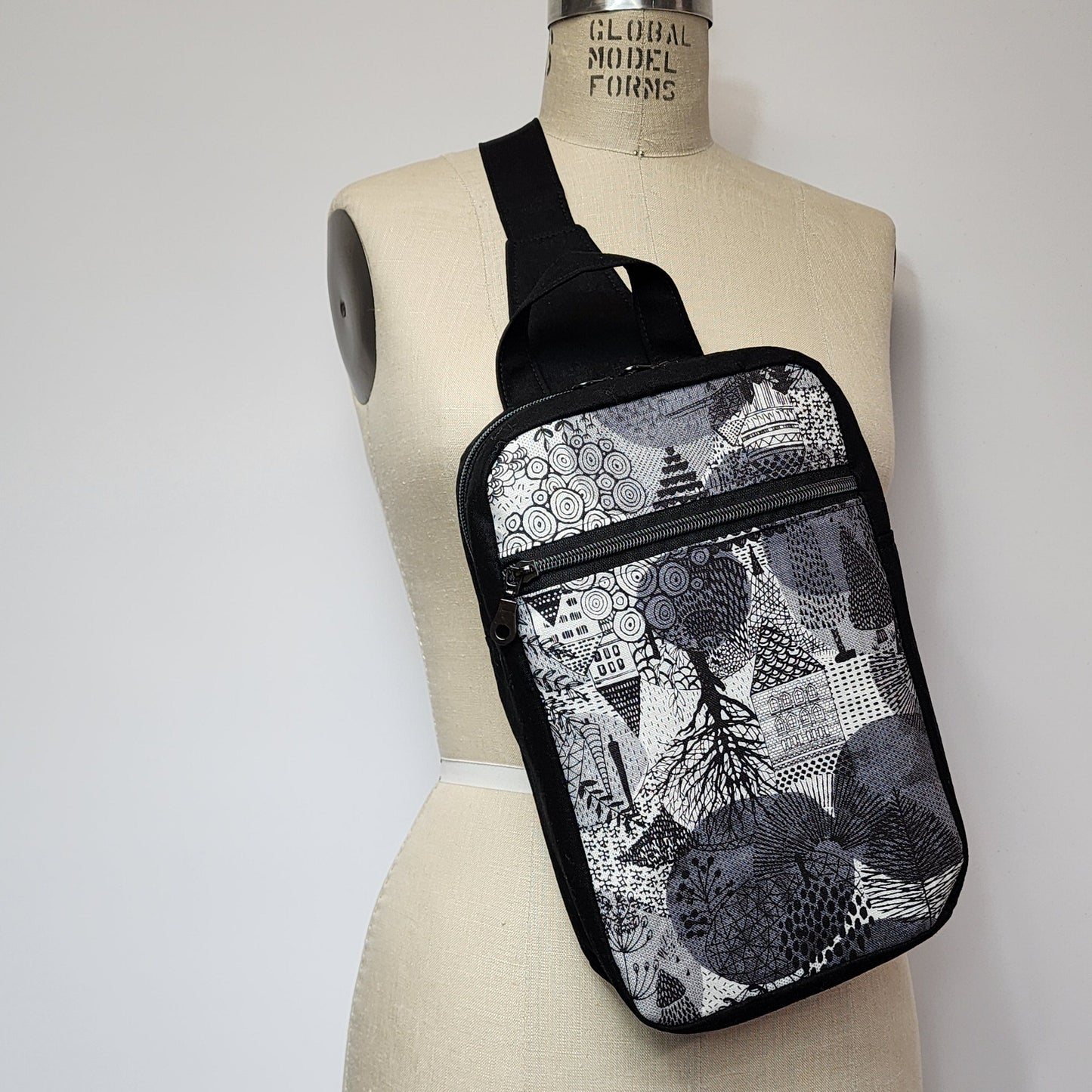 
                  
                    Sling Cross Body Bag in Neighborhood Walk
                  
                