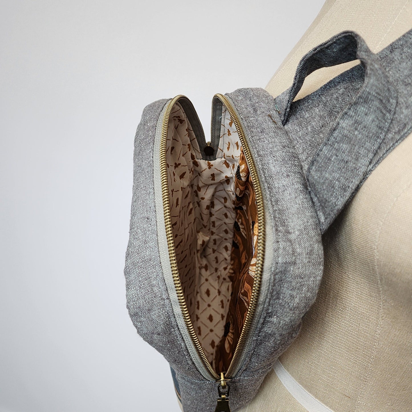 
                  
                    Sling Cross Body Bag in Wrented Skulls
                  
                