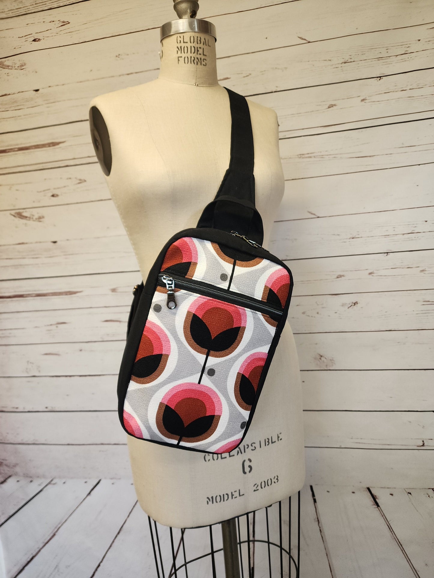 
                  
                    Sling Cross Body Bag in Mod Tulips
                  
                