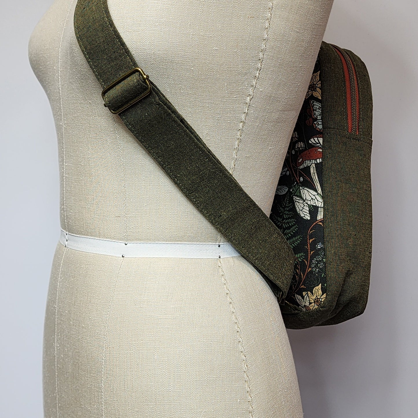
                  
                    Sling Cross Body Bag in Forest Flora
                  
                