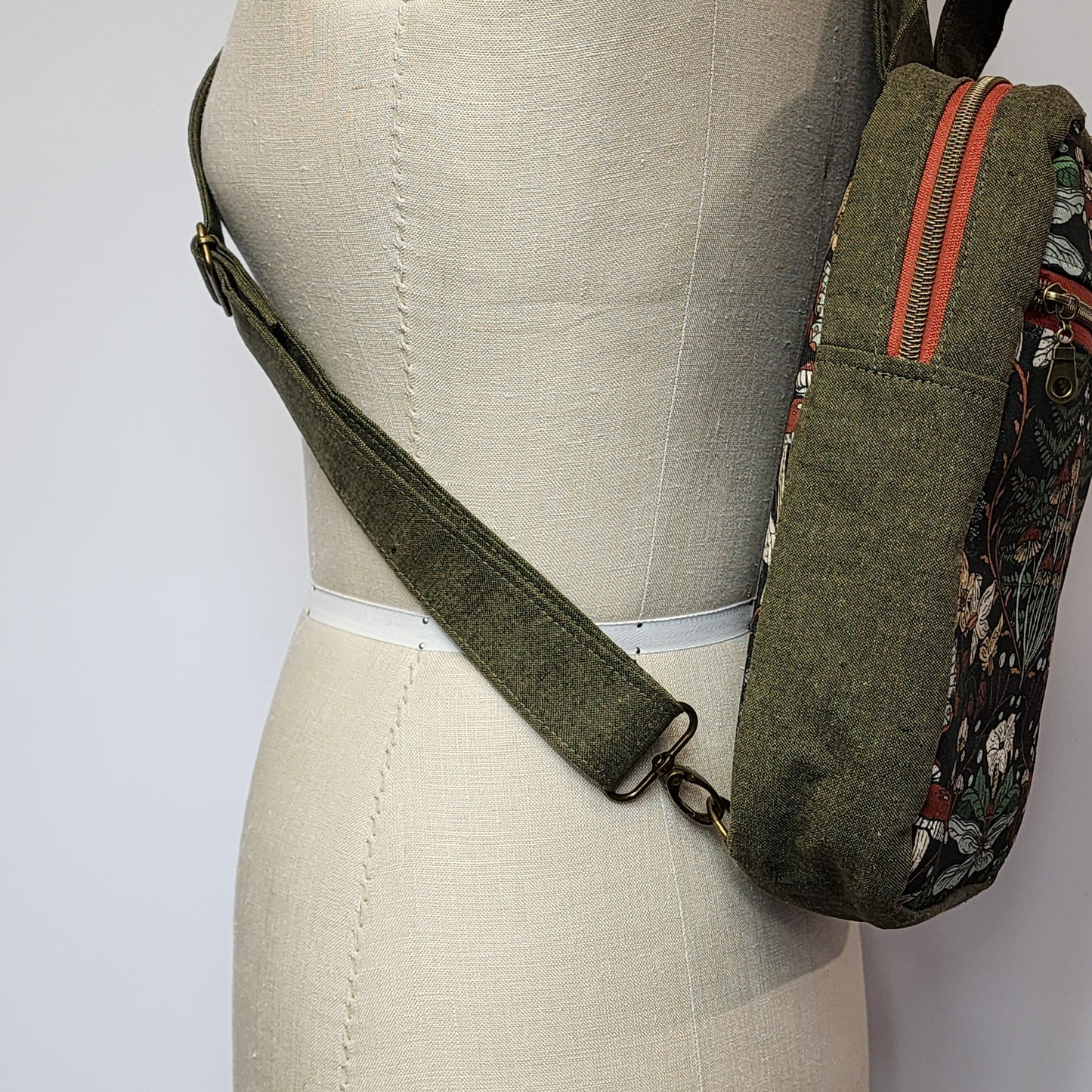 
                  
                    Sling Cross Body Bag in Forest Flora
                  
                