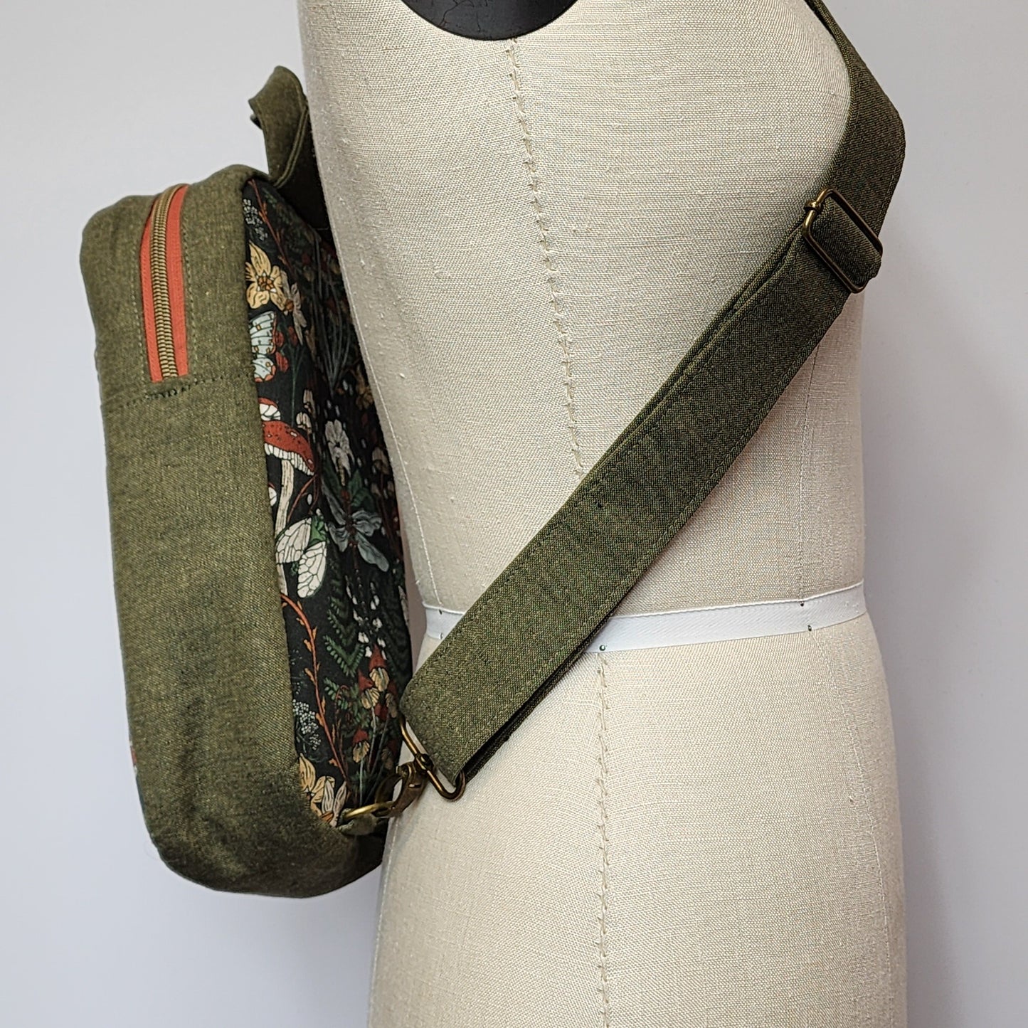
                  
                    Sling Cross Body Bag in Forest Flora
                  
                