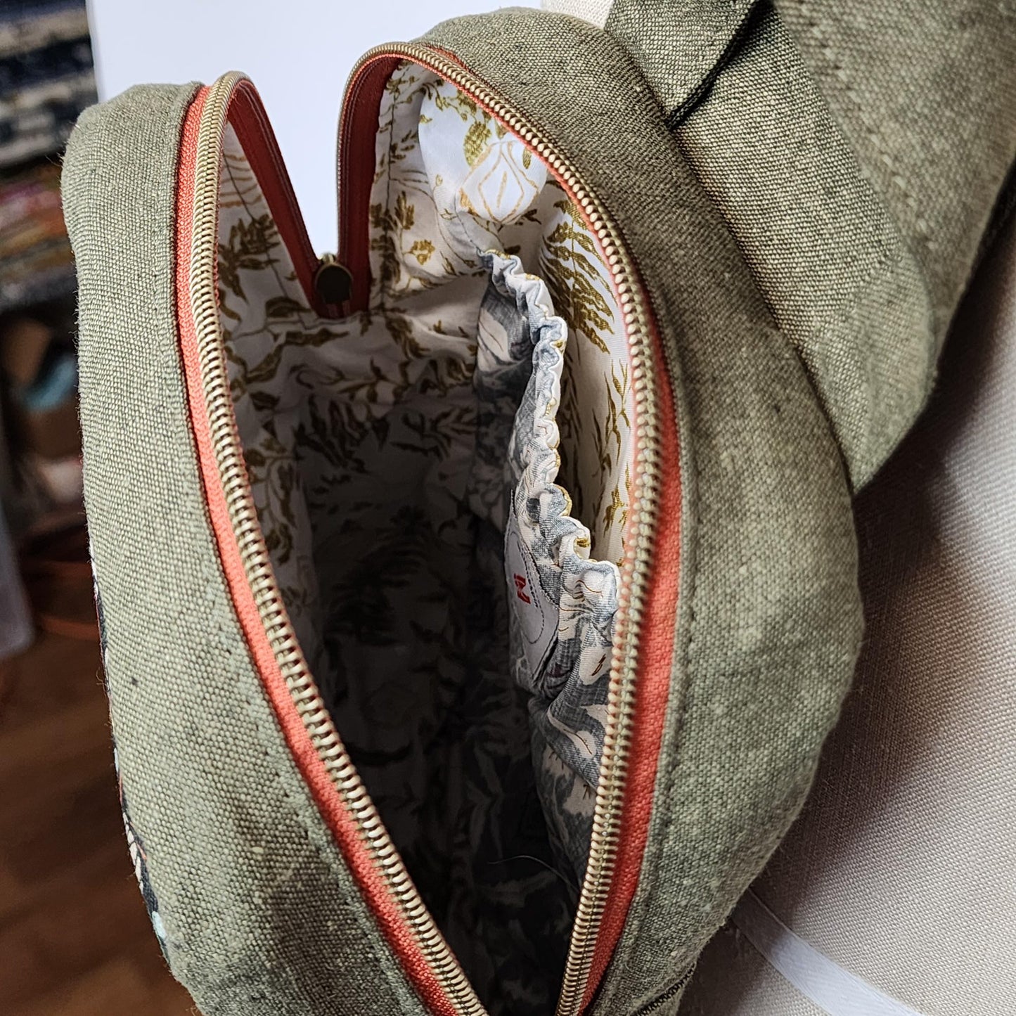 
                  
                    Sling Cross Body Bag in Forest Flora
                  
                