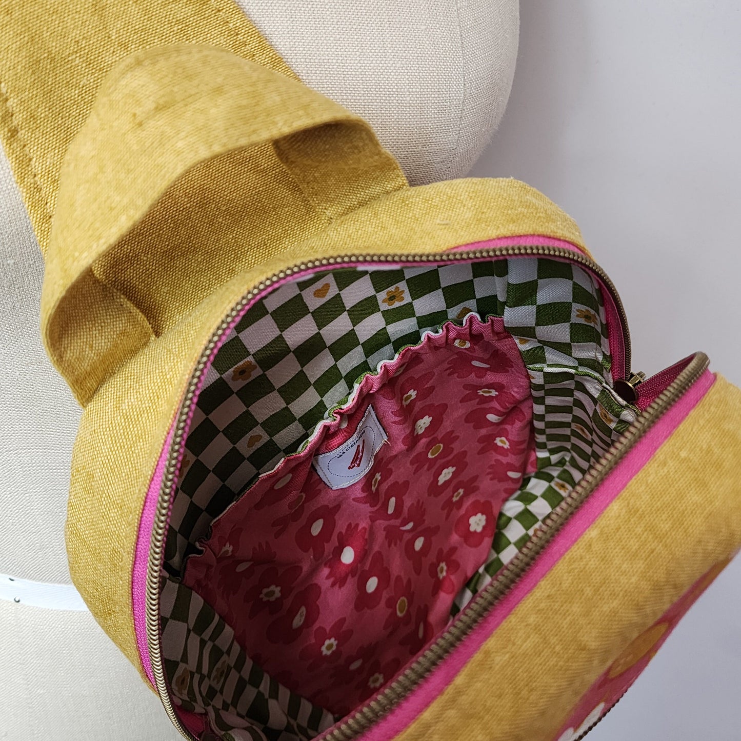 
                  
                    Sling Cross Body Bag in Joyful June Floral
                  
                
