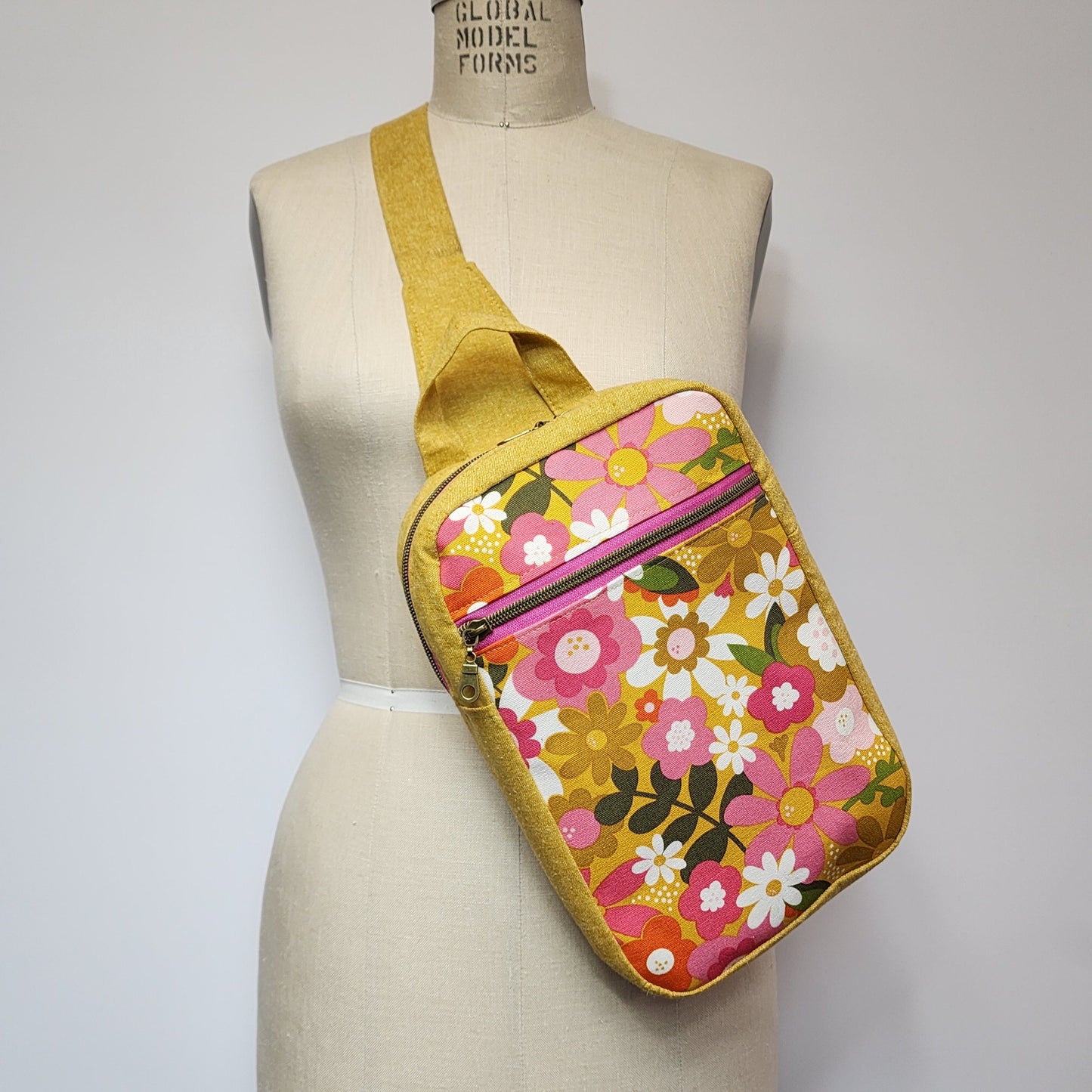 
                  
                    Sling Cross Body Bag in Joyful June Floral
                  
                