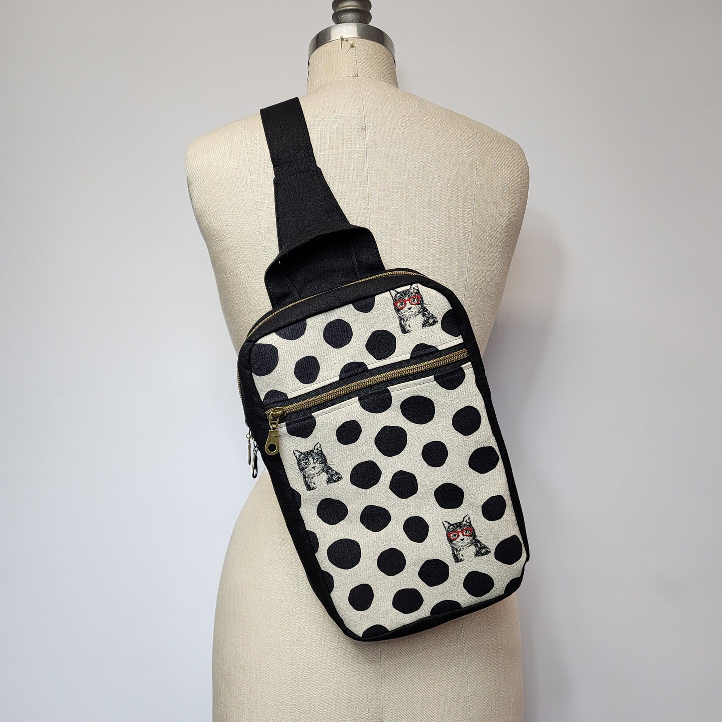 
                  
                    Sling Cross Body Bag in Kitty Spots
                  
                