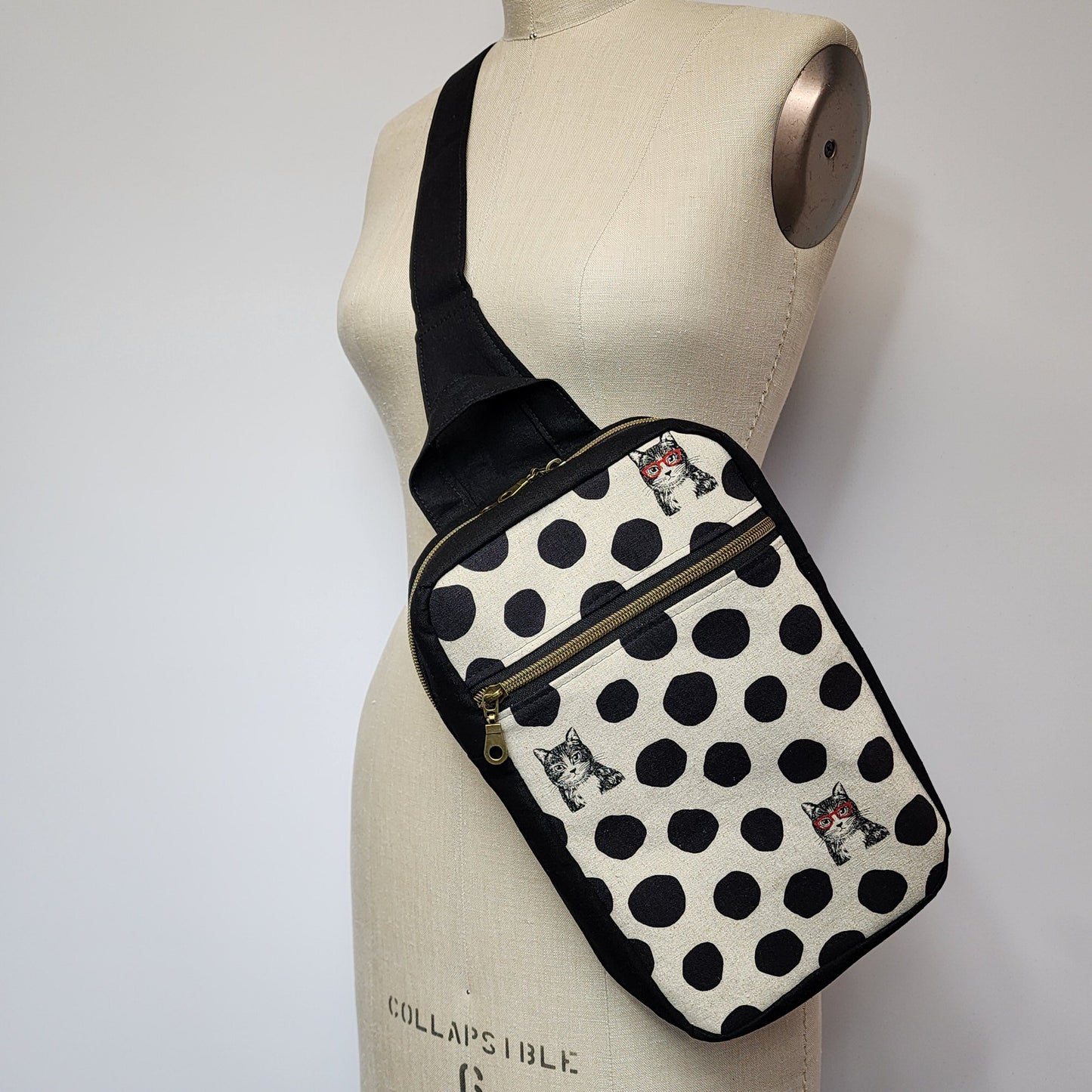 
                  
                    Sling Cross Body Bag in Kitty Spots
                  
                