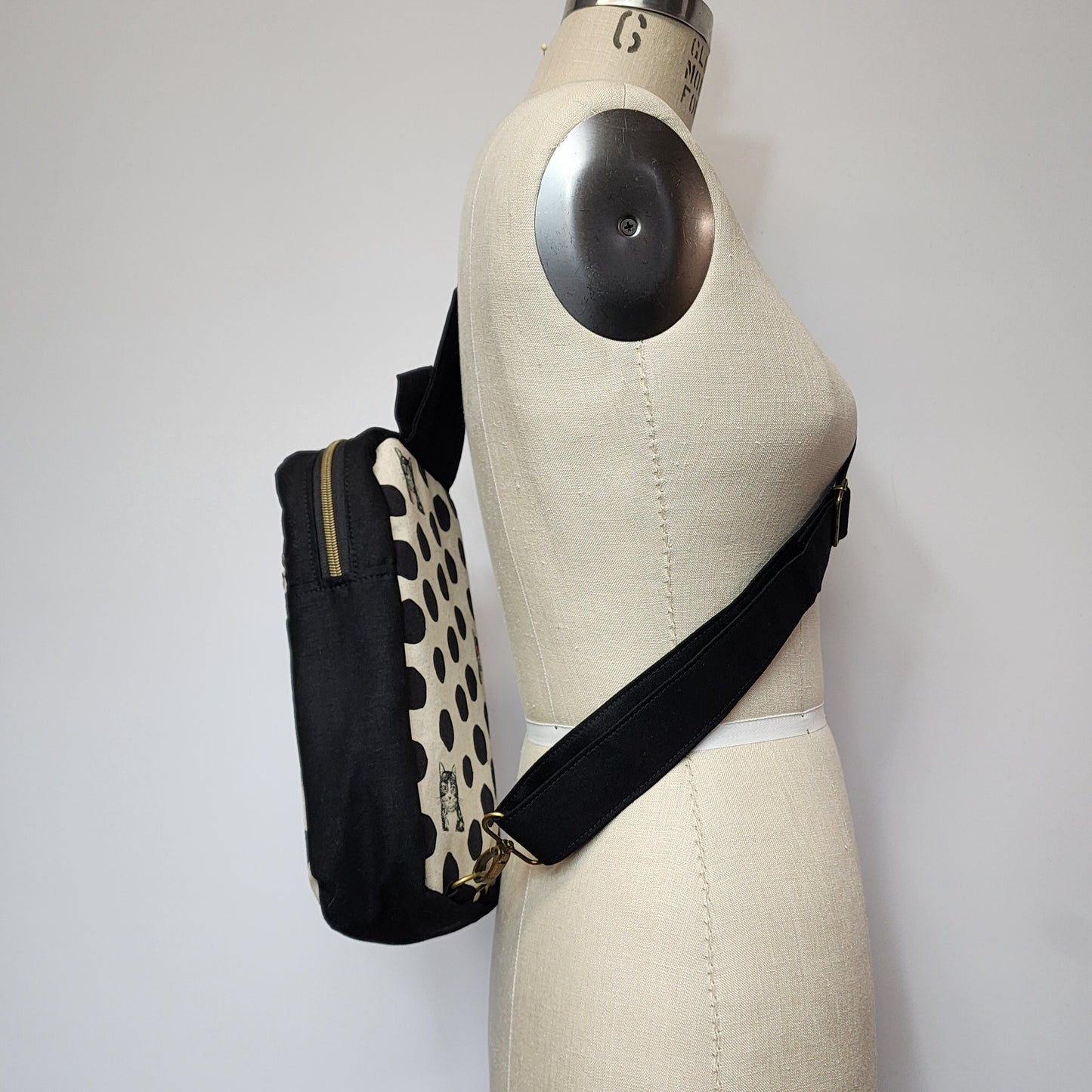 
                  
                    Sling Cross Body Bag in Kitty Spots
                  
                